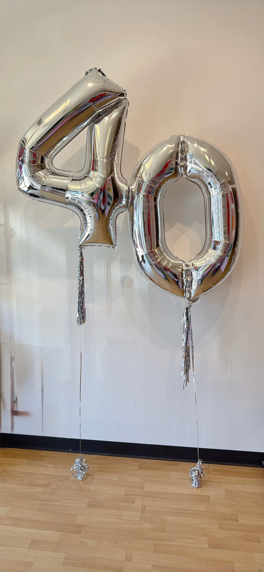 Helium number balloons with coordinating fringe