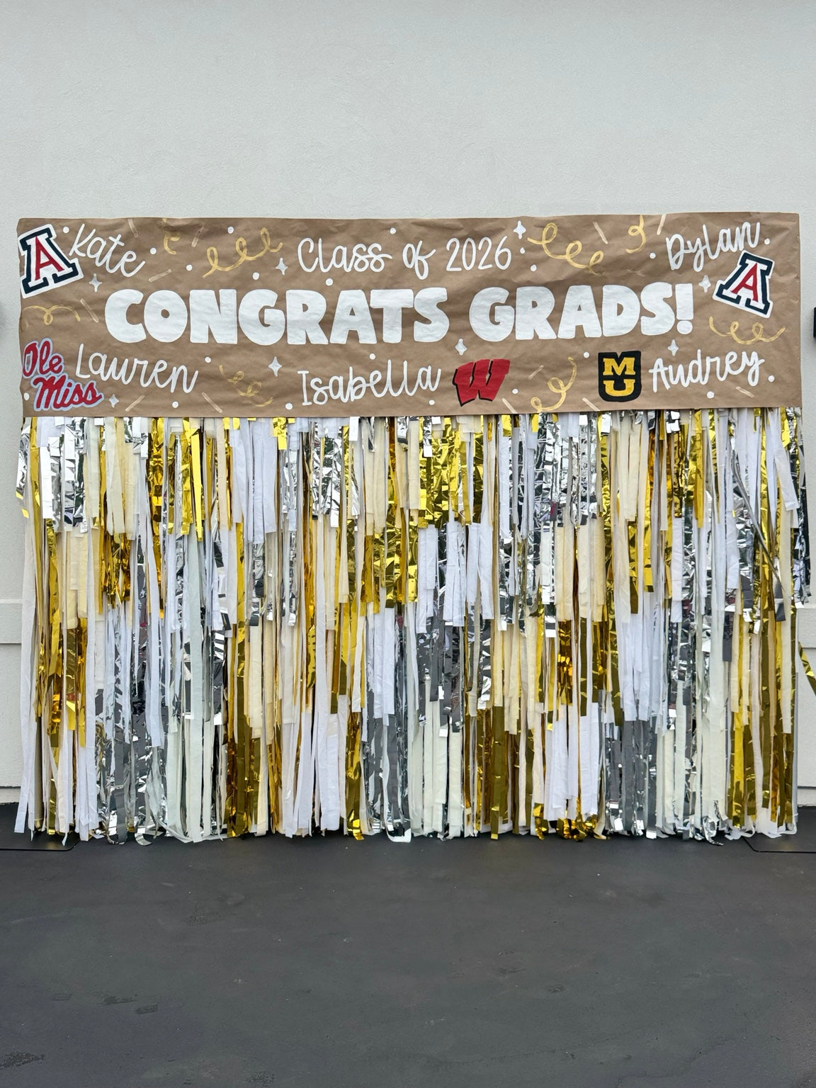 Party Hop personalized graduation fringe wall rental